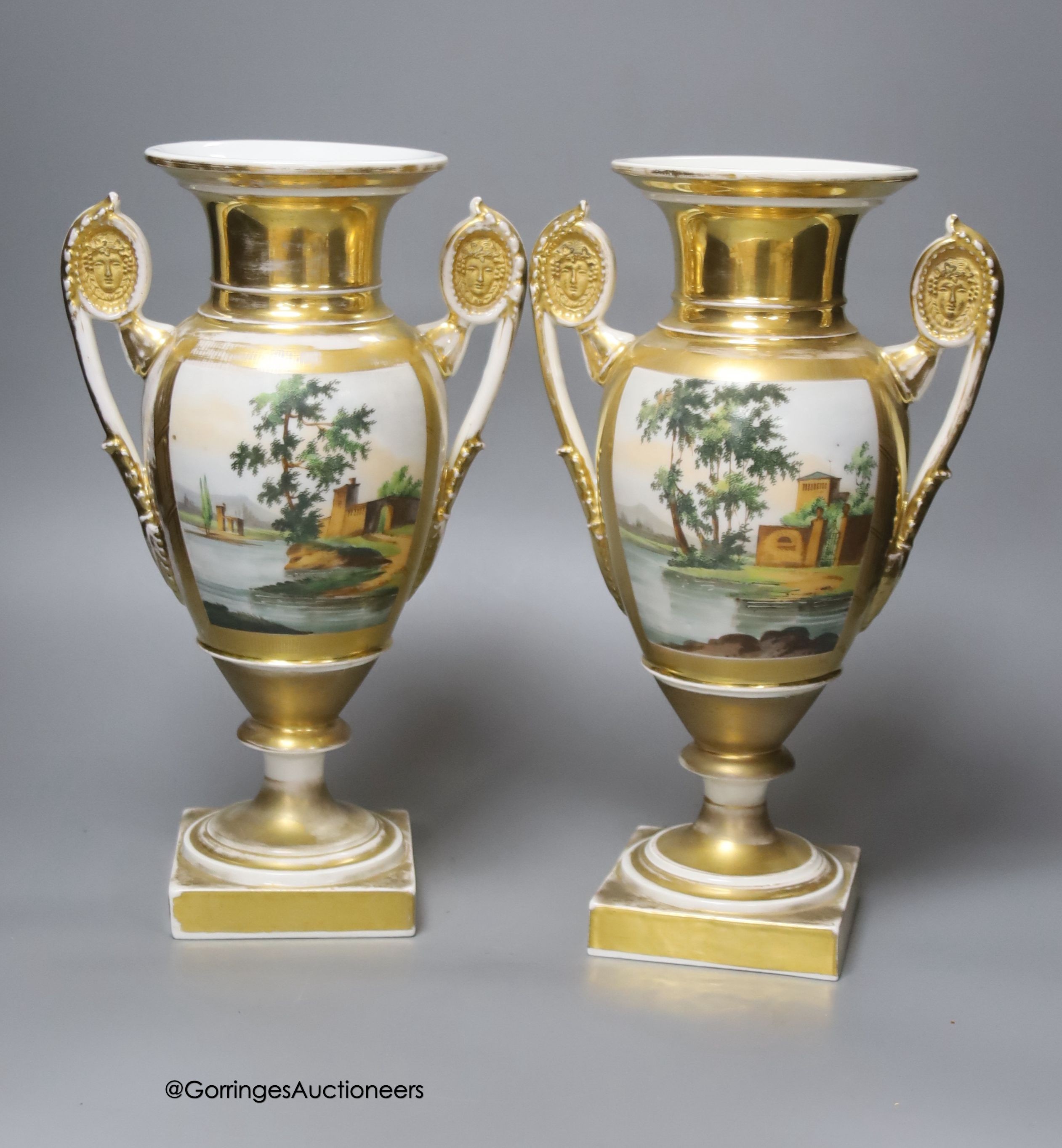 A pair of 19th century Paris vases decorated with medieval interiors, height 30cm